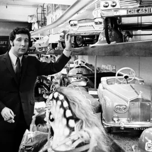 Singer Tom Jones Christmas shopping in London for his 11-year-old son. 3rd December 1968