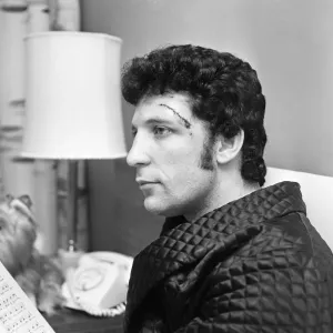 Singer Tom Jones at home with stitched head wound caused by a recent car crash Singer Tom Jones at home with stitched head wound caused by a recent car crash