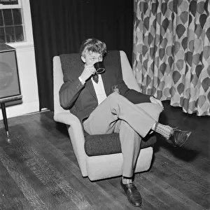 Singer Tommy Steele enjoys a cup of tea, 28th April 1961