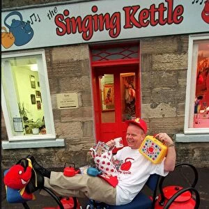 Singing Kettle Artie Trezise January 1998 outside shop home offices of Singing