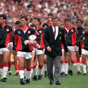 Sir Alex Ferguson leads Manchester United on to the pitch - Print Sir Alex Ferguson leads Manchester United on to the pitch - Print