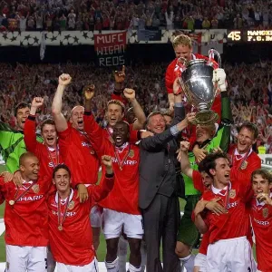 Sir Alex Ferguson and the Manchester United squad celebrate after winning the European Sir Alex Ferguson and the Manchester United squad celebrate after winning the European