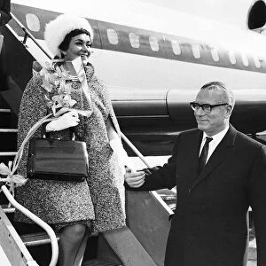 Sir Laurence Olivier actor and wife Joan Plowright actress arriving at London Airport