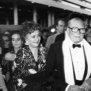 Sir Laurence Olivier actor and wife Joan Plowright actress outside National Theatre