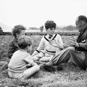 Sir Malcolm Campbell seen here talking to some young admirers inbetween tests he is Sir Malcolm Campbell seen here talking to some young admirers inbetween tests he is