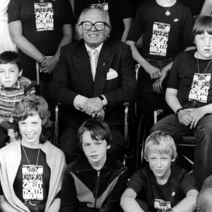 Sir Richard Attenborough with children involved in a sponsored wheelchair push in Sir Richard Attenborough with children involved in a sponsored wheelchair push in