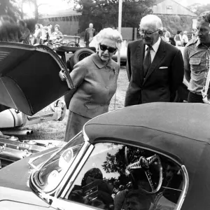 Sir William Lyons and Lady Lyons with an E-type Jaguar Print Sir William Lyons and Lady Lyons with an E-type Jaguar Print