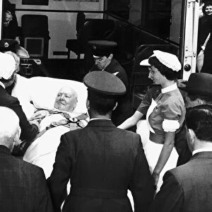 Sir Winston Churchill arriving at a private patients entrance of the Middlesex Hospital