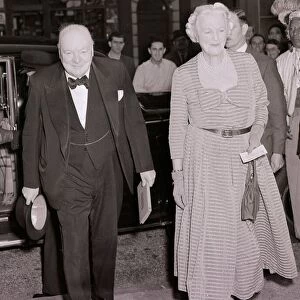 Sir Winston Churchill seen here arriving at the Scala Theatre with his wife. August 1952
