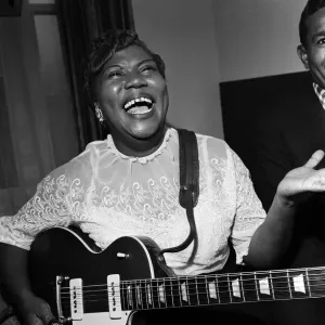 Sister Rosetta Tharpe giving a performance on her guitar. London, 21st November 1957 Sister Rosetta Tharpe giving a performance on her guitar. London, 21st November 1957