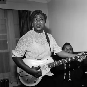 Sister Rosetta Tharpe giving a performance on her guitar. London, 21st November 1957 Sister Rosetta Tharpe giving a performance on her guitar. London, 21st November 1957