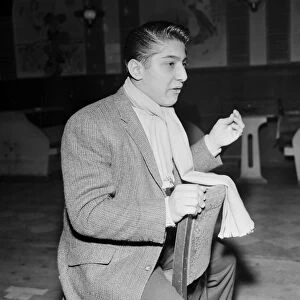 Sixteen year old Canadian singer songwriter Paul Anka pictured rehearsing for his