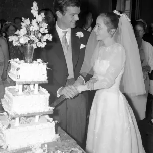Sixteen year old Caroline Jayne Beuttler and husband Allan Clark 30 seen here cutting te Sixteen year old Caroline Jayne Beuttler and husband Allan Clark 30 seen here cutting te