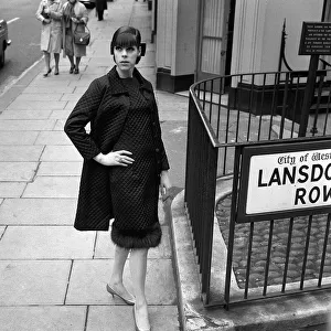 Sixties Fashion by Kiki Byrne Model wearing a black dress with matching coat