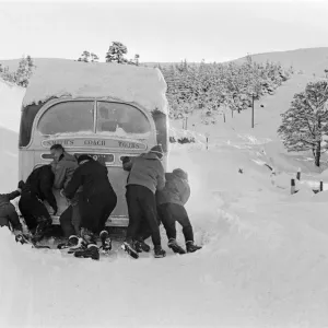 Skiers in the Cairngorms, a mountain range in the eastern Highlands of Scotland Skiers in the Cairngorms, a mountain range in the eastern Highlands of Scotland
