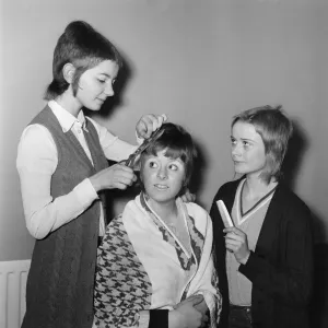Skinhead girls who have ordered to let their hair grow by the headmistress at Tolworth Skinhead girls who have ordered to let their hair grow by the headmistress at Tolworth