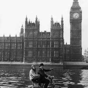 Skipper Hornsby and Stella scoot up the Thames at a fair rate of knots on their scooter