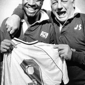 Sky Blues manager John Sillett hands the number 9 shirt to Cyrille Regis for tomorrow Sky Blues manager John Sillett hands the number 9 shirt to Cyrille Regis for tomorrow