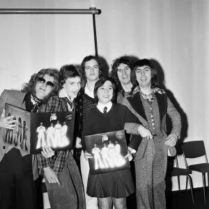 Slade (l-r Noddy Holder, Jim Lea, Don Powell and Dave Hill) pictured with prize winners Slade (l-r Noddy Holder, Jim Lea, Don Powell and Dave Hill) pictured with prize winners