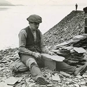 Slate production 1930s Seil Island near Oban workman splitting slates with special