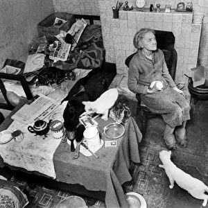 Slum housing in Birmingham. Mrs Alice Swanton aged 70 sits in her decaying terrace