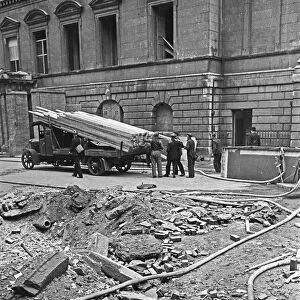 A small crater outside The Mansion House in the City of London which was damaged by