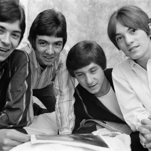 The Small Faces pop group pictured in a provincial hotel room as they watch their latest The Small Faces pop group pictured in a provincial hotel room as they watch their latest