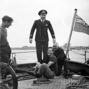 Small ships pool. The engineers amuse themselves on the the winch during their leisure Small ships pool. The engineers amuse themselves on the the winch during their leisure