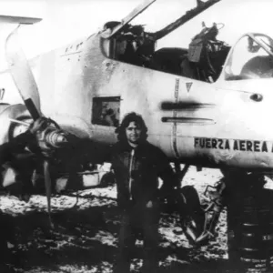 SMILING FALKLAND ISLANDERS WITH A DAMAGED ARGENTINE FMA IA PUCARA GROUND ATTACK AIRCRAFT SMILING FALKLAND ISLANDERS WITH A DAMAGED ARGENTINE FMA IA PUCARA GROUND ATTACK AIRCRAFT
