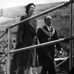 The smiling Queen, escorted by Lord Mayor of Birmingham
