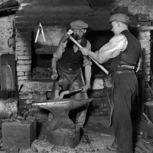 Smiths at Work Print: Blacksmith Shop Scene, 1930