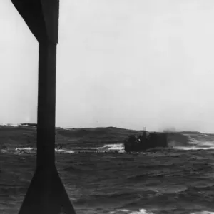 Print of Smoke belching German Uboat U744 after being attacked