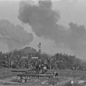 Smoke rising in the distance as armoured units of the South Vietnamese army shell Viet Smoke rising in the distance as armoured units of the South Vietnamese army shell Viet