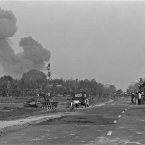 Smoke rising in the distance as armoured units of the South Vietnamese army shell Viet Smoke rising in the distance as armoured units of the South Vietnamese army shell Viet