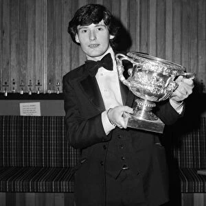 Snooker player Jimmy White pictured receiving a trophy from Cliff Thorburn at Kingston