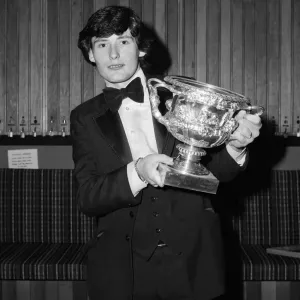 Snooker player Jimmy White pictured receiving a trophy from Cliff Thorburn at Kingston Snooker player Jimmy White pictured receiving a trophy from Cliff Thorburn at Kingston