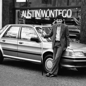 Snooker player Jimmy White poses beside a new model Austin Montego. 11th May 1984 Snooker player Jimmy White poses beside a new model Austin Montego. 11th May 1984