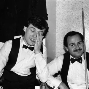 Snooker player Jimmy Whiteshares a joke with a fellow snooker player in the dressing room Snooker player Jimmy Whiteshares a joke with a fellow snooker player in the dressing room