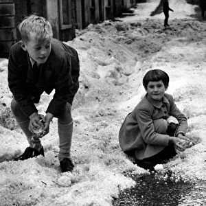 "Snowballs"of hailstones brought fun for these children in Castle Street