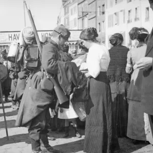 A soldier of the French 6th Army says goodbye to his wife at Le Harve before moving up to