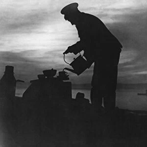 Soldier prepares early morning tea at Suvla Bay during the evacuation