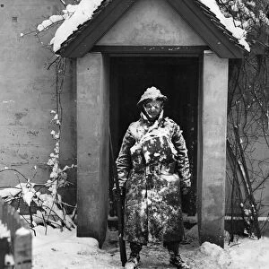 Soldier on sentry duty during a snow storm somewhere in Kent during the Second World War