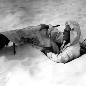 Soldier wearing desert camouflage in North Africa circa 1942. WW2 Soldier wearing desert camouflage in North Africa circa 1942. WW2