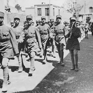 Soldiers of the Iranian infantry seen here parading through Teheran shortly after