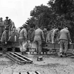 Soldiers of The Royal Engineers build bridges to help local residents after heavy floods Soldiers of The Royal Engineers build bridges to help local residents after heavy floods