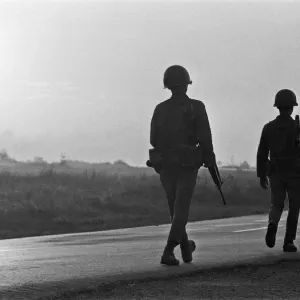 Soldiers of the South Vietnamese army advance on Viet Cong positions in Trang Bang just Soldiers of the South Vietnamese army advance on Viet Cong positions in Trang Bang just