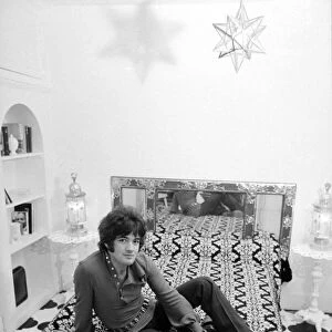 Songwriter Barry Ryan (dark shirt) in his flat in North Audley Street