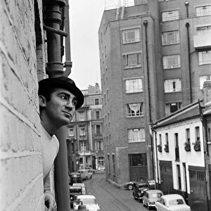 Songwriter and composer Lionel Bart at his flat in South Kensington