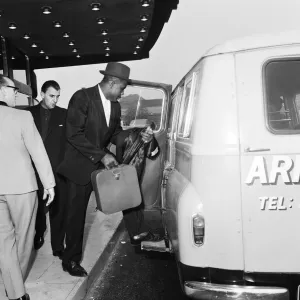 Sonny Liston, World Heavyweight Champion, pictured at London Heathrow Airport as he heads Sonny Liston, World Heavyweight Champion, pictured at London Heathrow Airport as he heads