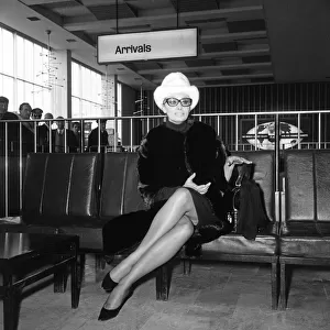 Sophia Loren arriving at London Airport from Paris. She will be going to Yorkshire for 3